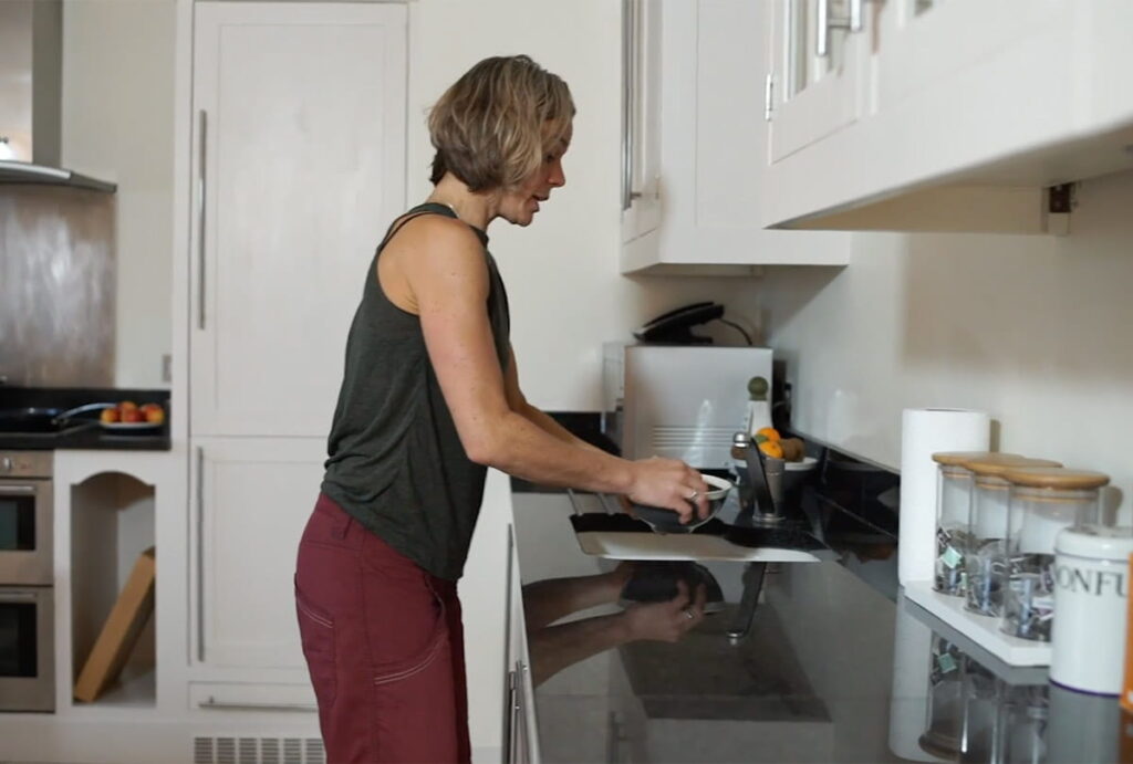 Leaning Forwards at a Sink