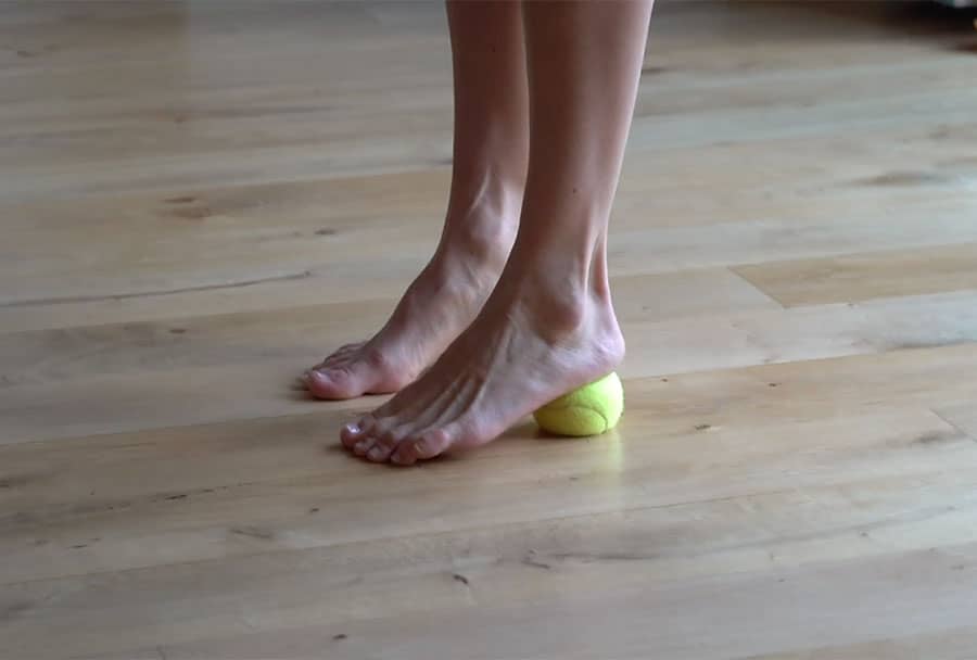 Two Minutes of Standing on Tennis Balls